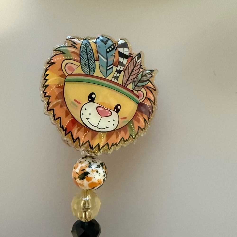 Yellow Lion Feather Headband badge reel